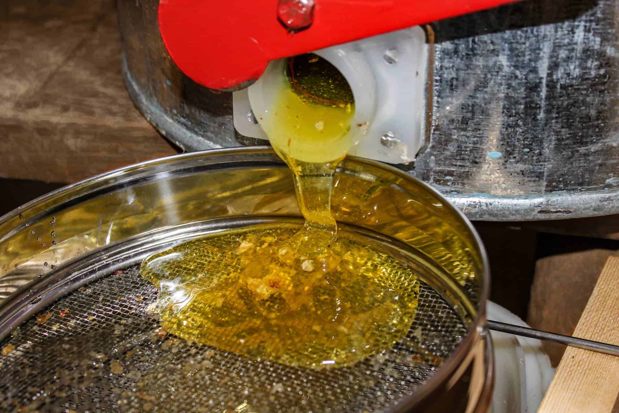 How to clean beeswax from a strainer.