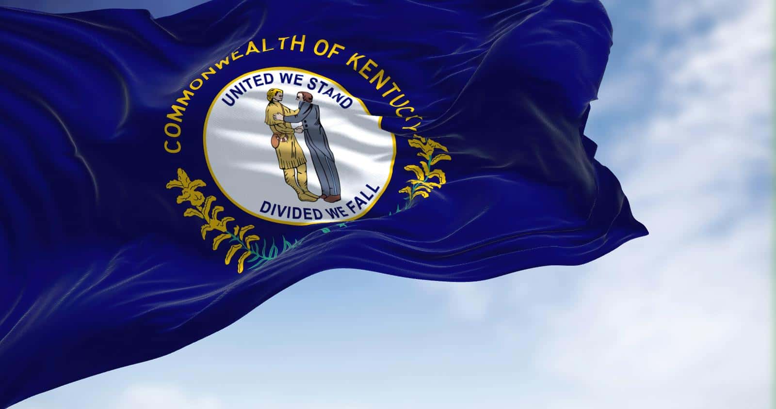 The US state flag of Kentucky waving in the wind. Kentucky is a state in the Southeastern region of the United States. Democracy and independence.